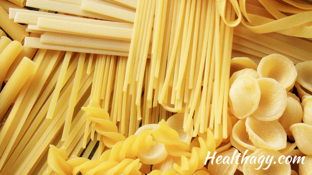 Pasta is a yellow, ivory color.  It comes in long shoe string shapes and spiral shapes. spir