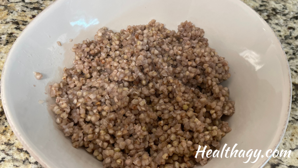 cooked buckwheat groats in a white bowl