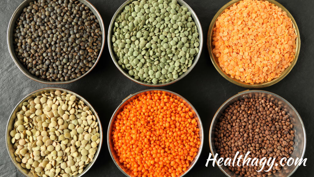 small bowls containing brown, green, red, white and other lentils